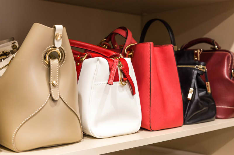 Collection of handbags in woman`s closet