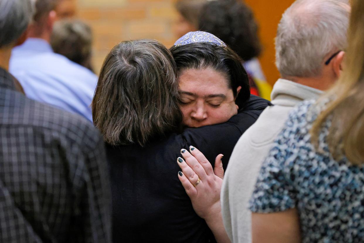 Rabbi Abby Jacobson of Emanuel Synagogue hugs another person after the Oklahoma City Jewish Community Prayer Vigil for Israel, at Temple B'nai Israel in Oklahoma City, Thursday, Oct. 12, 2023.