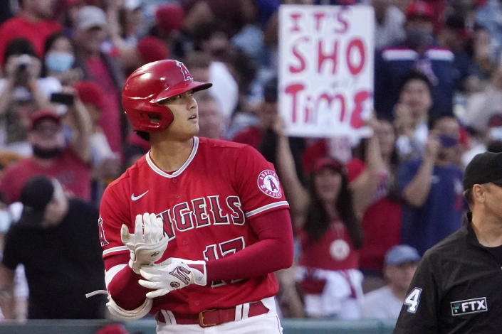 Los Angeles Angels designated hitter Shohei Ohtani stands on third after hitting an Rbi triple during the first inning of a baseball game against the Seattle Mariners Saturday, Sept. 25, 2021, in Anaheim, Calif. (AP Photo/Mark J. Terrill)