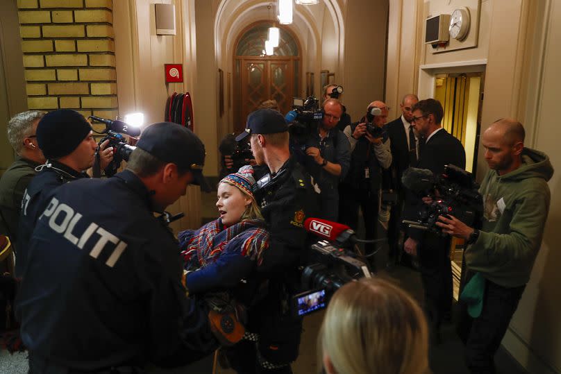 Demonstrators are carried out from the Norwegian Parliament in Oslo, 11 October 2023.