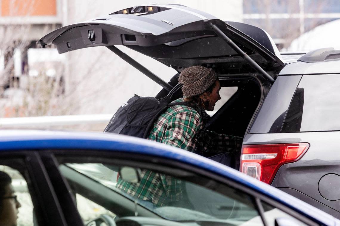 Cars unload travelers at the arrivals drop-off at the Boise Airport on Tuesday, Dec. 28, 2021.