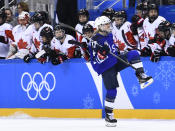 <p>Team USA celebrates winning after a penalty shootout in the women’s gold medal ice hockey match between Canada and the US during the Pyeongchang 2018 Winter Olympic Games at the Gangneung Hockey Centre in Gangneung on February 22, 2018. / AFP PHOTO / Ed JONES </p>