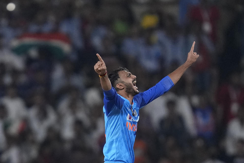 India's Axar Patel celebrates the dismissal of Australia's Glenn Maxwell during the second T20 cricket match between India and Australia, in Nagpur, India, Friday, Sept. 23, 2022. (AP Photo/Rafiq Maqbool)