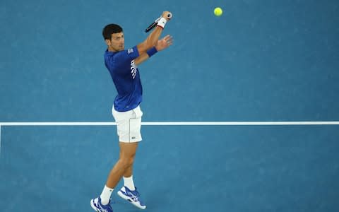MELBOURNE, AUSTRALIA - JANUARY 25: Novak Djokovic of Serbia plays a backhand in his men's semi final match against Lucas Pouille of France during day 12 of the 2019 Australian Open at Melbourne Park on January 25, 2019 in Melbourne, Australia - Credit: &nbsp;Getty Images&nbsp;