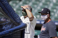 Detroit Tigers general manager Al Avila, left, watches batting practice during baseball training camp at Comerica Park Friday, July 3, 2020, in Detroit. (AP Photo/Duane Burleson)