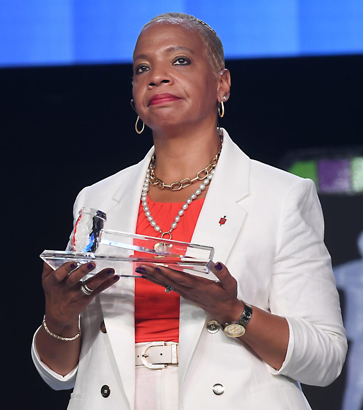 To acknowledge the transition in leadership for the UMC Council of Bishops, outgoing council president New York Bishop Rev. Thomas Bickerton passes the gavel to incoming council president Ohio Bishop Rev. Tracy Malone. This is Bishop Rev. Tracy Malone with the gavel.