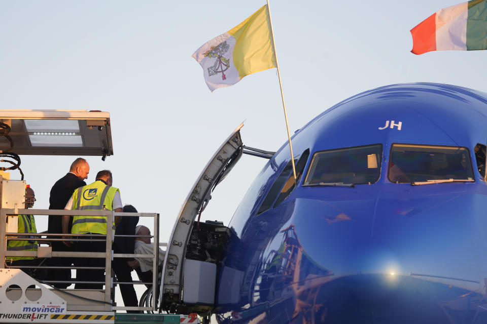 Pope Francis arrives at Rome's Leonardo da Vinci International airport in Fiumicino to start his three-day trip to Kazakhstan, Tuesday, Sept. 13, 2022. (AP Photo/Domenico Stinellis)