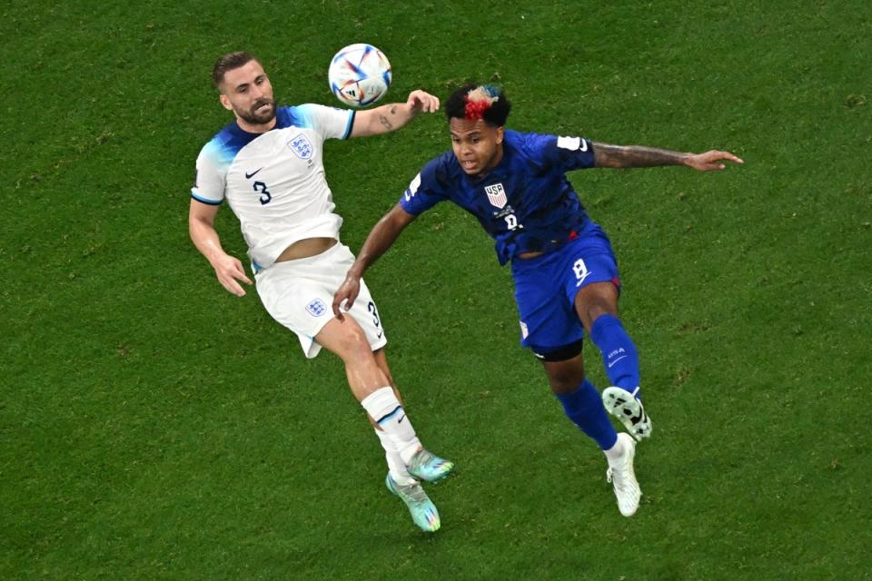 Luke Shaw fights for the ball with Weston McKennie (AFP via Getty Images)