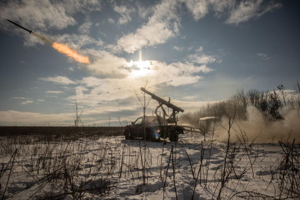 Ukrainian soldiers fire with an improvised multiple rocket launcher on Russian positions on January 15, 2024, in Donetsk Oblast, Ukraine.