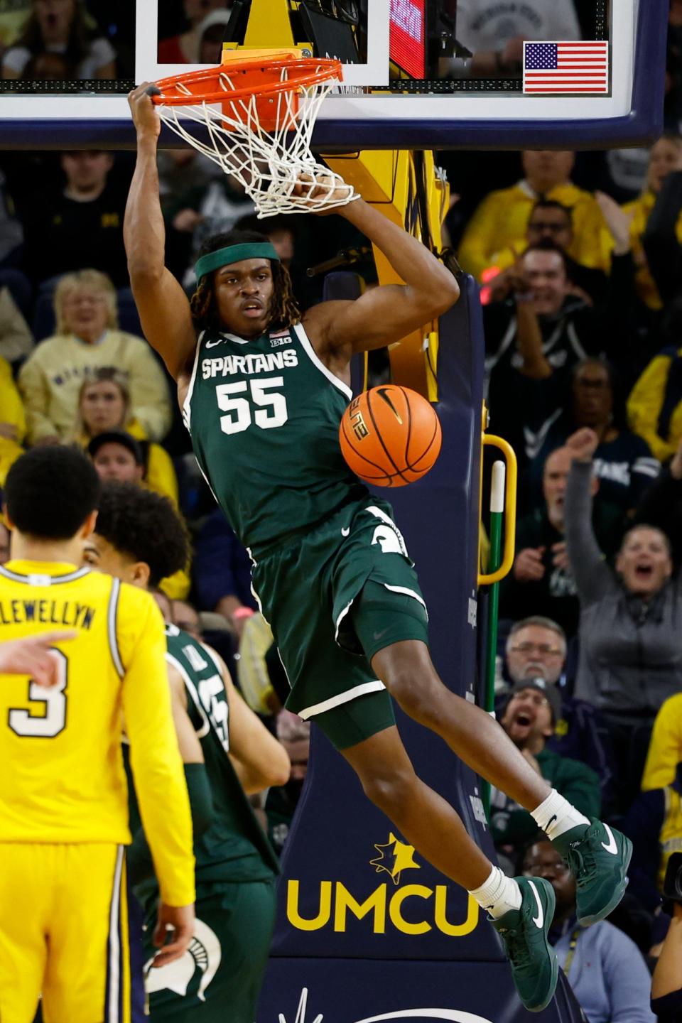 Michigan State Spartans forward Coen Carr dunks in the first half against the Michigan Wolverines at Crisler Center in Ann Arbor on Saturday, Feb. 17, 2024.