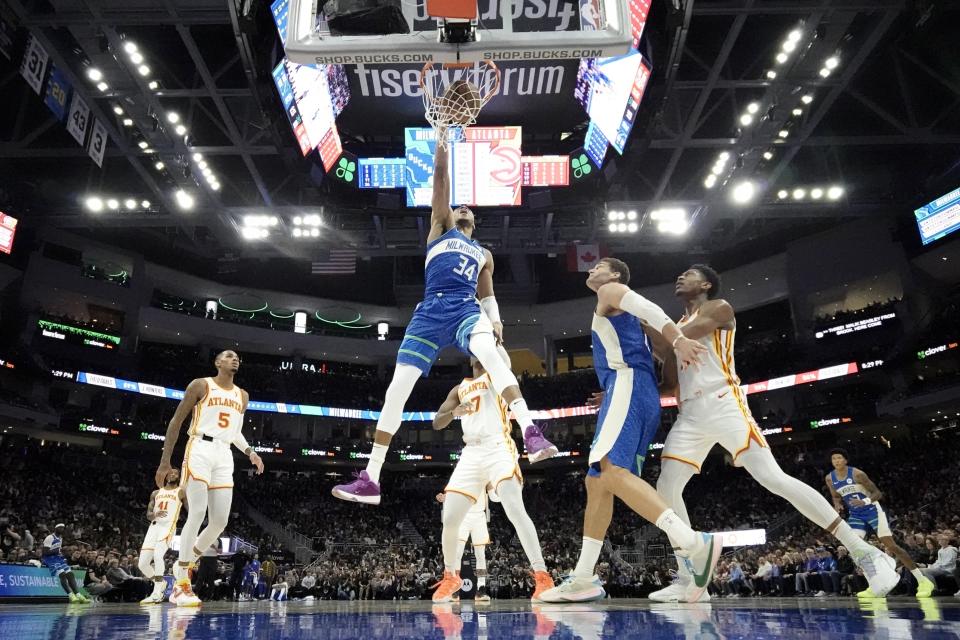 Milwaukee Bucks' Giannis Antetokounmpo dunks during the second half of an NBA basketball game against the Atlanta Hawks Saturday, Dec. 2, 2023, in Milwaukee. The Bucks won 132-121. (AP Photo/Morry Gash)