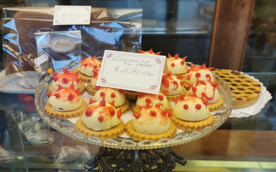 Chefs at Pasticceria Mangini 1876 in Genova Italy have created coronavirus-themed biscuits in an attempt to make light of the widespread contagion, and have sold hundreds in the space of a few days - Caters News Agency