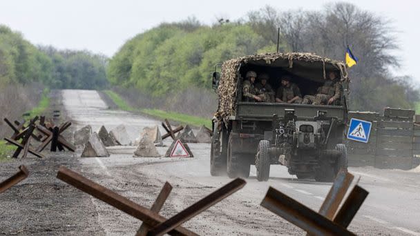 PHOTO: A Ukrainian military vehicle drives to the front line during a fight with Russian forces near Izyum in Kharkiv Oblast, eastern Ukraine, on April 23, 2022. (Jorge Silva/Reuters)