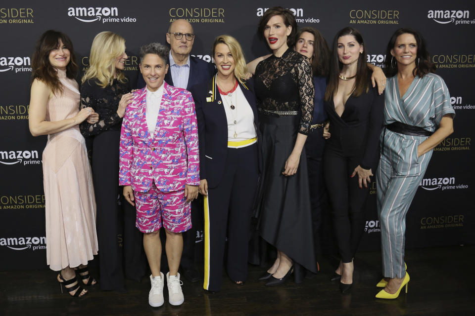 Kathryn Hahn, from left, Judith Light, Jill Soloway, Jeffrey Tambor, Alanis Morissette, Our Lady J, Gaby Hoffmann, Trace Lysette and Amy Landecker arrive at the "Transparent" FYC special screening at The Hollywood Athletic Club on Saturday, April 22, 2017, in Los Angeles. (Photo by Willy Sanjuan/Invision/AP)