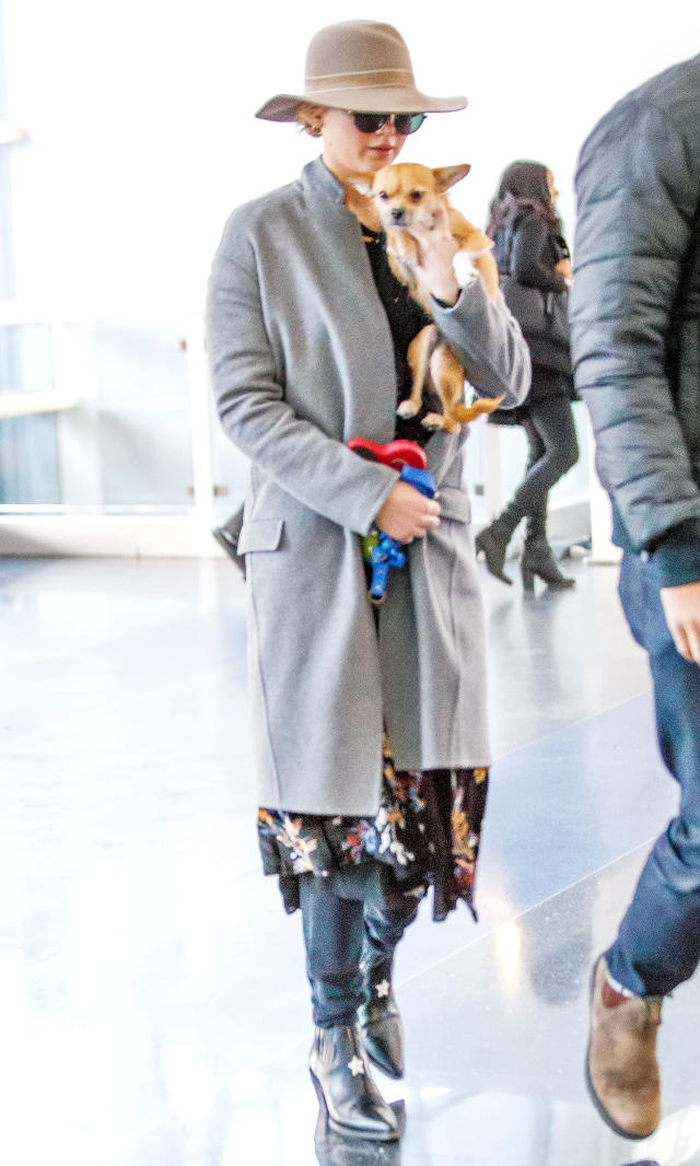 Hilary Duff Elevates Look With Cozy Heather Gray Scarf Wrapped