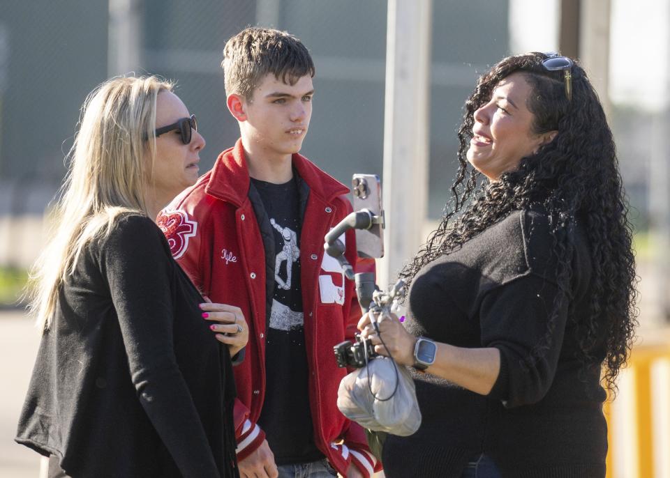 People react after a press conference where law enforcement officials announced that 11-year-old Audrii Cunningham was found dead in the Trinity River near her home in Livingston, Texas, Tuesday, Feb. 20, 2024, in Livingston. | Jason Fochtman, Houston Chronicle via Associated Press