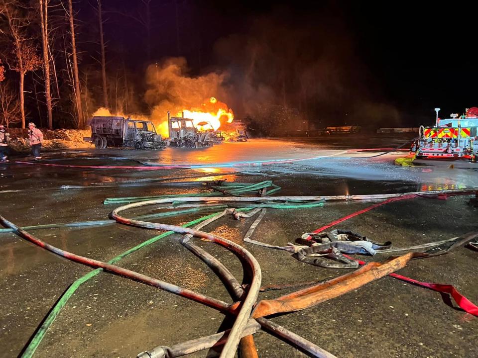 Firefighters battled a blaze that broke out Saturday night at North Atlantic Fuels, where three fuel oil tanker trucks were on fire.