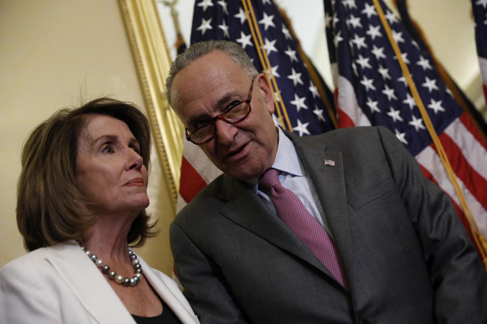 Senate Minority Leader Chuck Schumer speaks with House Minority Leader Nancy Pelosi at a news conference about the Child Care for Working Families Act at the U.S. Capitol, Sept. 14, 2017, in Washington, D.C. (Photo: Aaron P. Bernstein/Getty Images)