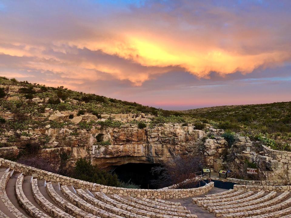 The Bat Flight Amphitheater is perfectly situated so visitors can see bats exiting Carlsbad Cavern's Natural Entrance from a safe distance.