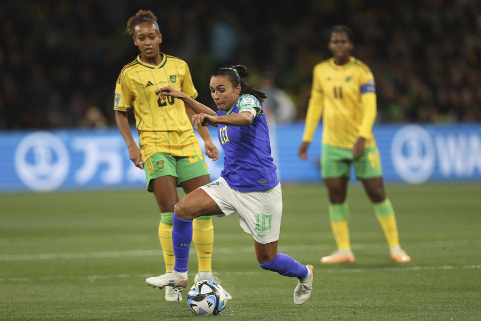 Brazil's Marta, center, controls the ball during the Women's World Cup Group F soccer match between Jamaica and Brazil in Melbourne, Australia, Wednesday, Aug. 2, 2023. (AP Photo/Hamish Blair)