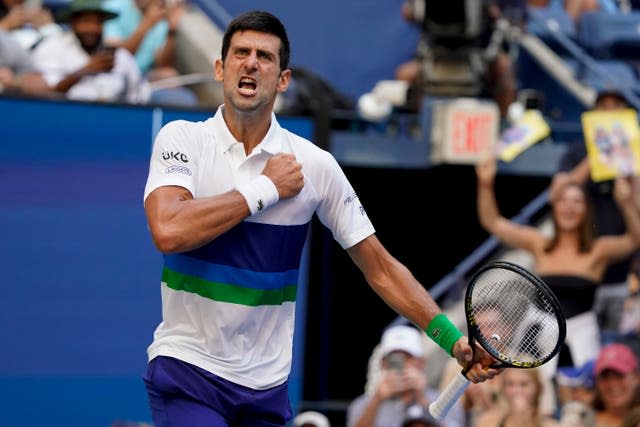 Novak Djokovic thumps his chest during his victory over Kei Nishikori