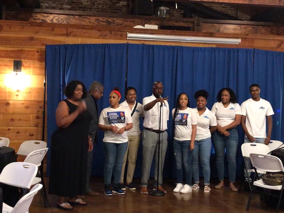 Augusta mayoral candidate Steven Kendrick stands with family members at a watch party Tuesday, May 24, 2022, in Augusta, Ga. Election results weren't in as of 10 p.m.