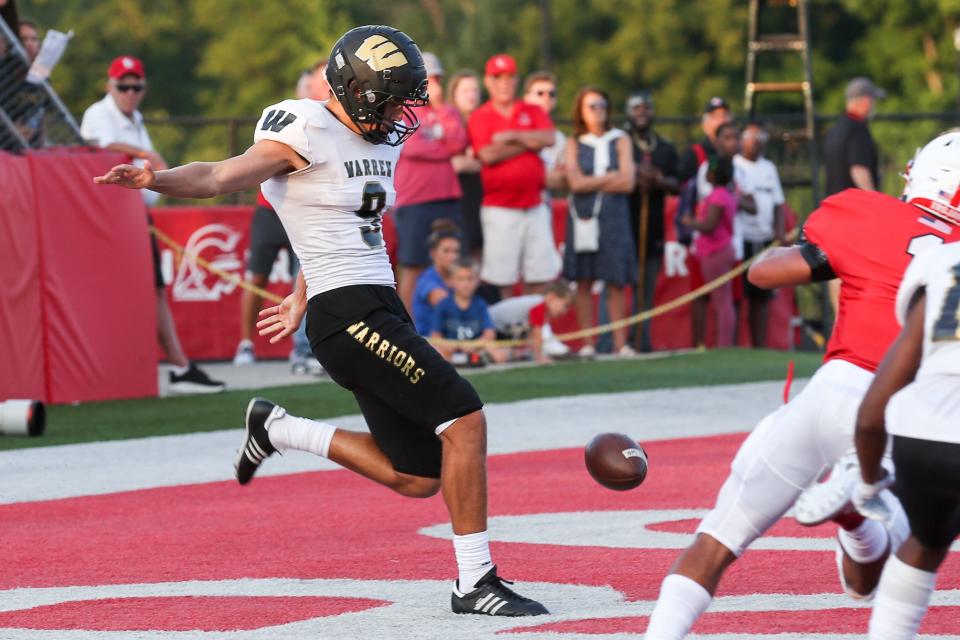 Warren Central Elijah Slibeck (9) punts from the end zone during Center Grove vs Warren Central IHSAA football,Aug 19, 2022; Greenwood, IN, USA;  at Center Grove High School.