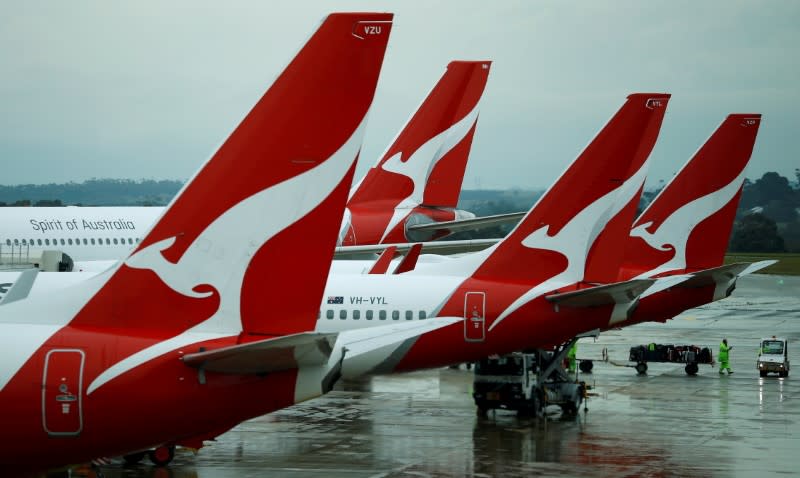 FILE PHOTO: Qantas aircraft are seen on the tarmac at Melbourne International Airport in Melbourne
