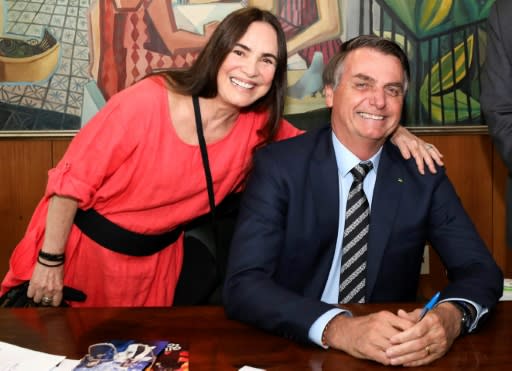 Brazilian actress Regina Duarte poses with Bolsonaro on January 29, 2020 after agreeing to become his culture secretary