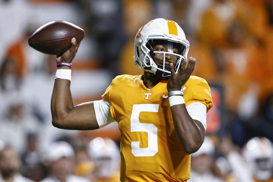 Tennessee quarterback Hendon Hooker throws to a receiver during the first half of the team's NCAA college football game against Mississippi on Saturday, Oct. 16, 2021, in Knoxville, Tenn. (AP Photo/Wade Payne)
