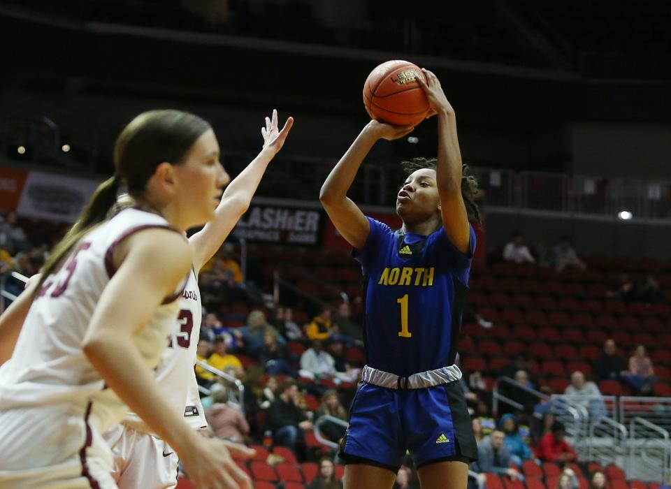 Davenport North guard Divine Bourrage has plenty of Division I college options to choose from.