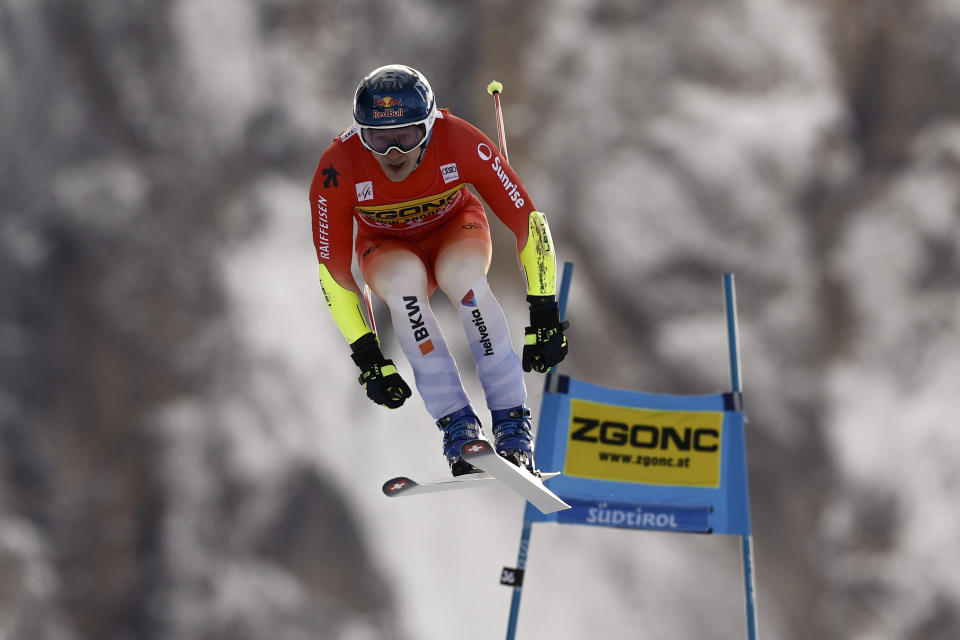 Switzerland's Marco Odermatt speeds down the course during an alpine ski, men's World Cup super-G race, in Val Gardena, Italy, Friday, Dec. 15, 2023. (AP Photo/Gabriele Facciotti)