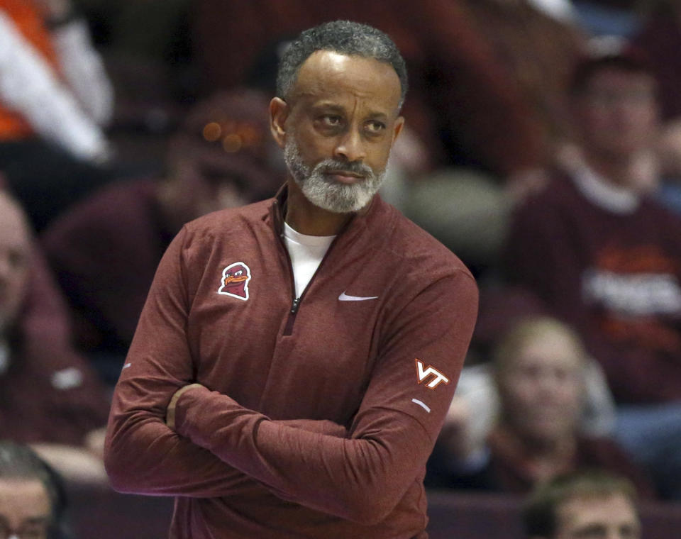 Virginia Tech head coach Kenny Brooks looks on in the first half of an NCAA basketball game against Virginia, Thursday, Feb. 1, 2024, in Blacksburg, Va. (Matt Gentry/The Roanoke Times via AP)