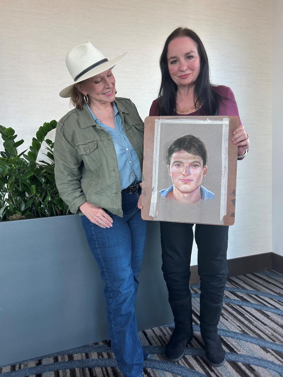 Lee Spencer White, founder of the Alamo Defenders Descendants Association, left, and forensic artist Lois Gibson with Gibson's rendition of what the person whose skull was discovered at the Alamo in 1979 had looked like.
