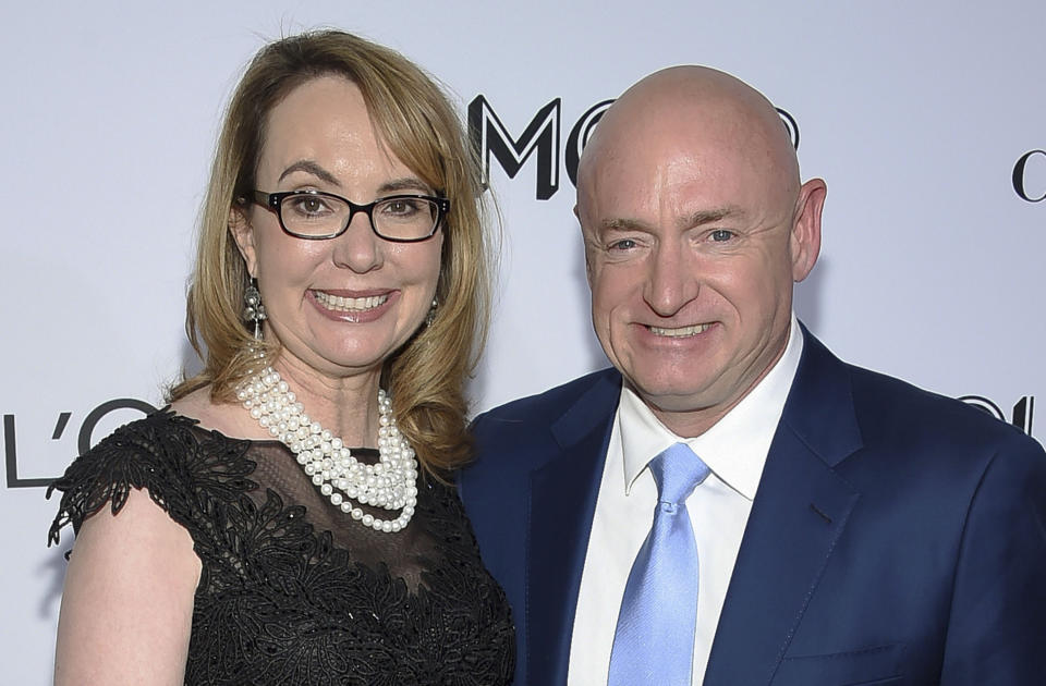 FILE- In this Nov. 12, 2018, file photo politician and gun control advocate Gabrielle Giffords and husband, retired astronaut Mark Kelly, attend the Glamour Women of the Year Awards at Spring Studios in New York. Kelli Ward, the head of the head of the Arizona Republican Party, said in a fundraising email that Democratic Senate candidate Mark Kelly will be stopped "dead in his tracks." The comment by Ward sparked an outcry from Democrats Friday, Sept. 6, 2019. Kelly became a prominent gun-control advocate after his wife, Gabrielle Giffords, was critically injured in a mass shooting while she was a member of Congress. (Photo by Evan Agostini/Invision/AP, File)