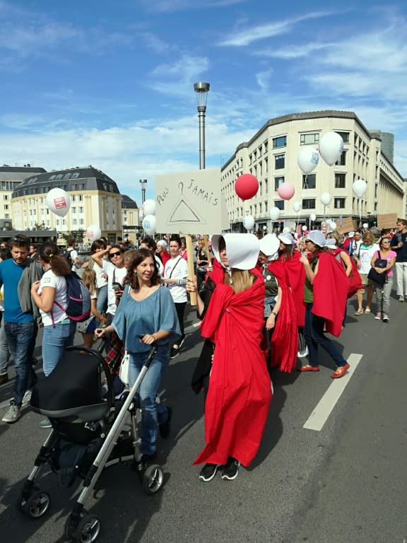 In Brussels in September 2018, pro-abortion protesters donned the instantly recognizable red habits and white bonnets for a demonstration