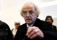 Thomas Walther -- the lawyer for the plaintiffs -- at the court ahead of the trial against former Nazi death camp officer Oskar Groening in Lueneburg, northern Germany, on April 21, 2015