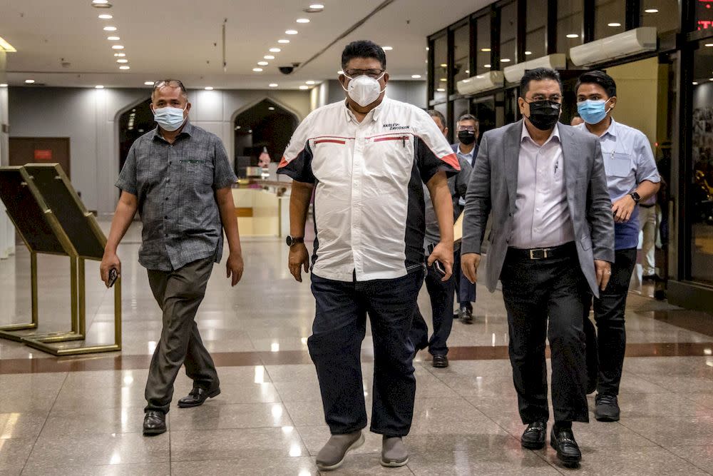 Melaka state assembly speaker Datuk Seri Ab Rauf Yusoh arrives for the Umno supreme council meeting at Umno headquarters in Kuala Lumpur on October 14, 2021. — Picture by Firdaus Latif