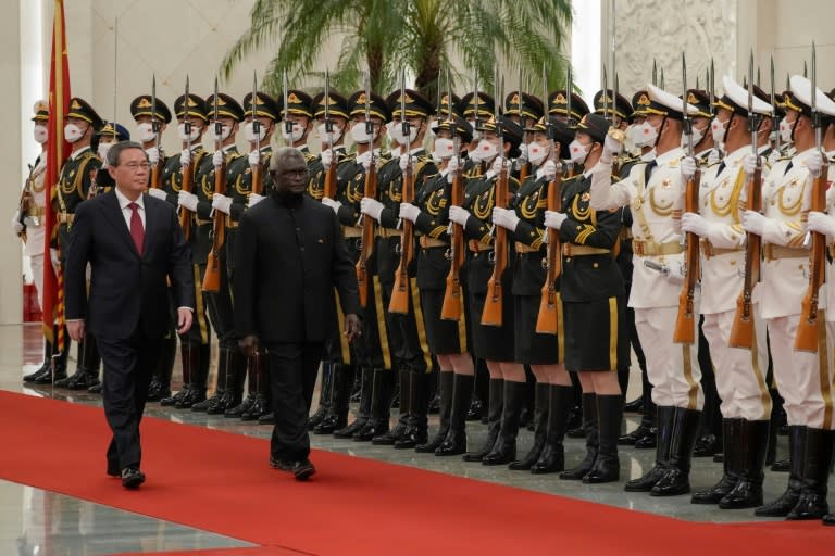 Solomon Islands has veered into China's orbit under Prime Minister Manasseh Sogavare (R) (Andy Wong)