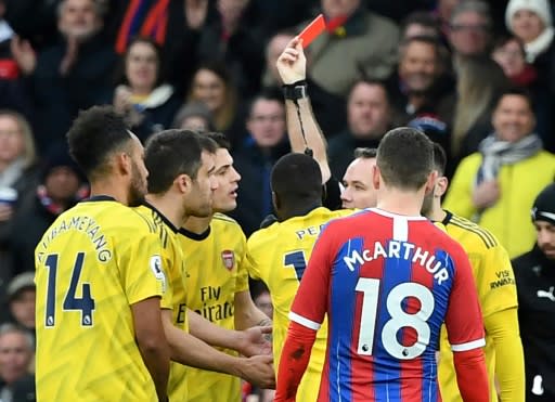 Arsenal striker Pierre-Emerick Aubameyang (left) is sent off in the Premier League match against Crystal Palace