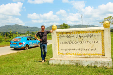 Dutch adventurer Wiebe Wakker on his electric car journey from the Netherlands to Australia, in Myanmar June 2017Êin this picture obtained from social media. Picture taken June 2017. WIEBE WAKKER/PLUG ME IN PROJECT/via REUTERS