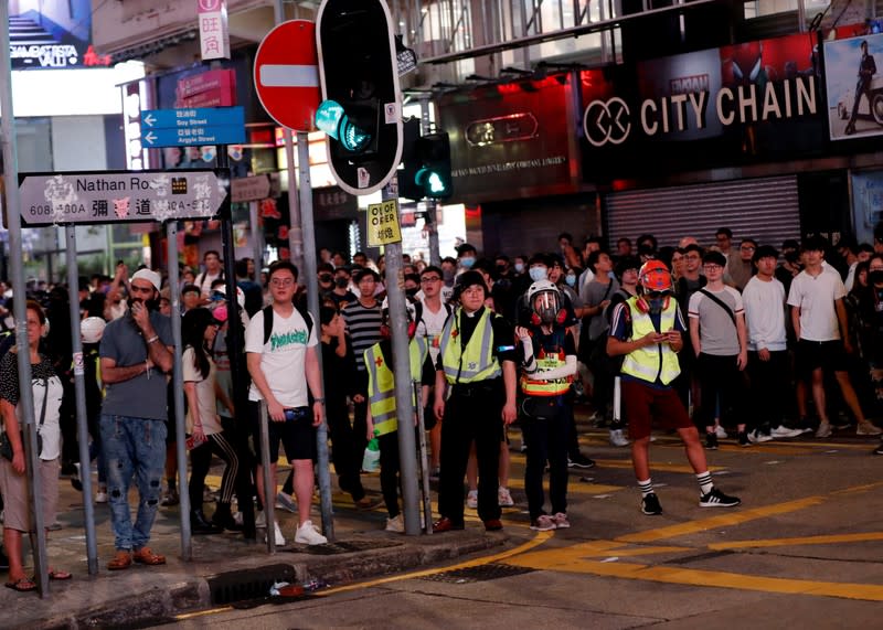 The Wider Image: Sermons with saline: Hong Kong pastor offers aid and prayers