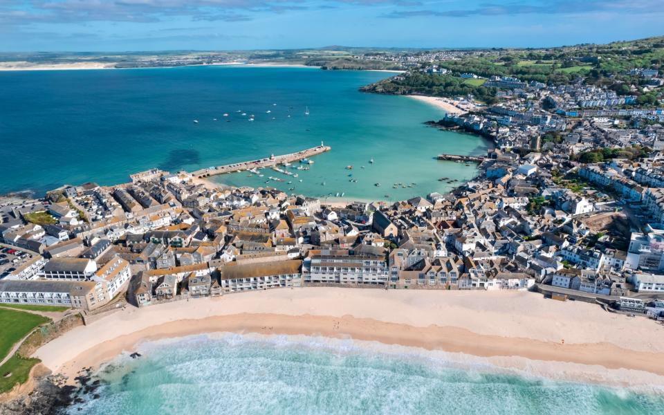 The beach and houses in St Ives - Scott Fisher