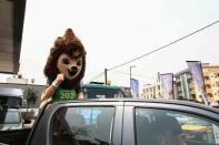Not lion around: Tournament mascot Mola goes on a trophy tour of Yaounde (AFP/Daniel Beloumou Olomo)
