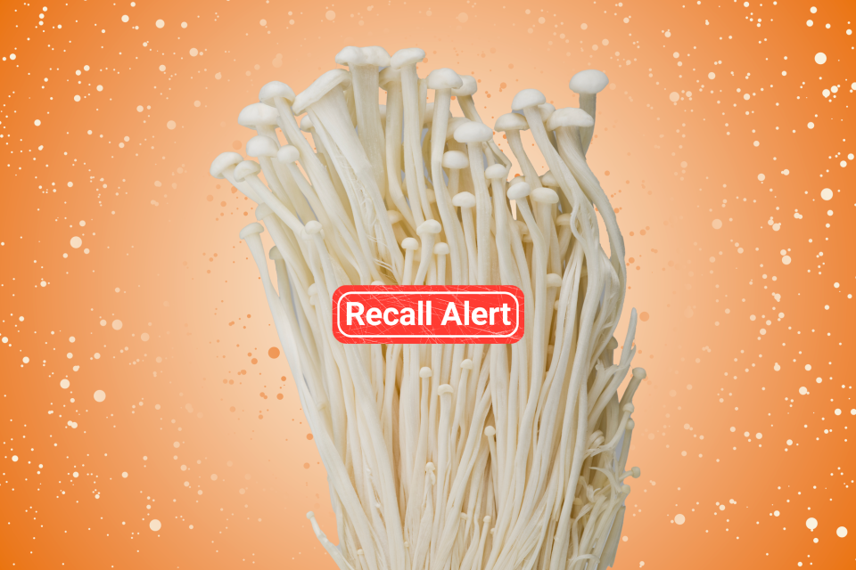 Enoki Mushrooms with a recall symbol on them