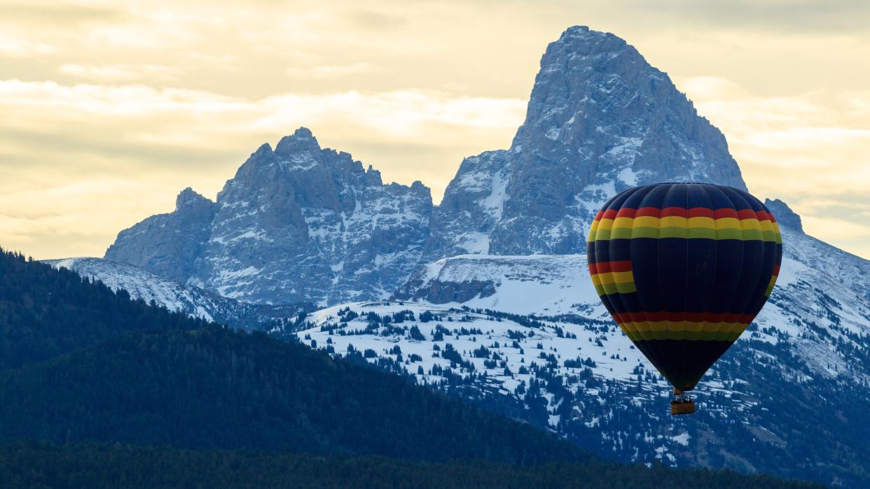  Hot air balloon with Grand Teton in background. 