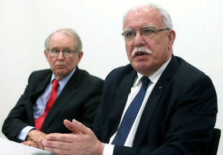 Palestinian Foreign Minister Riyad al-Maliki holds a news conference next to legal adviser John Dugard at the International Criminal Court in The Hague, Netherlands, May 22, 2018. REUTERS/Francois Walschaerts