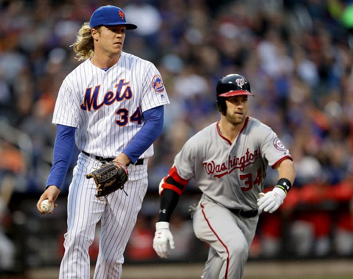 Noah Syndergaard (left) and Bryce Harper are not on the best of terms? (Getty Images) 