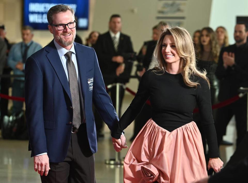 NASCAR Hall of Fame member Dale Earnhardt Jr., left, walks the red carpet at the NASCAR Hall of Fame in Charlotte, NC with his wife, Amy Earnhardt on Friday, January 19, 2024.