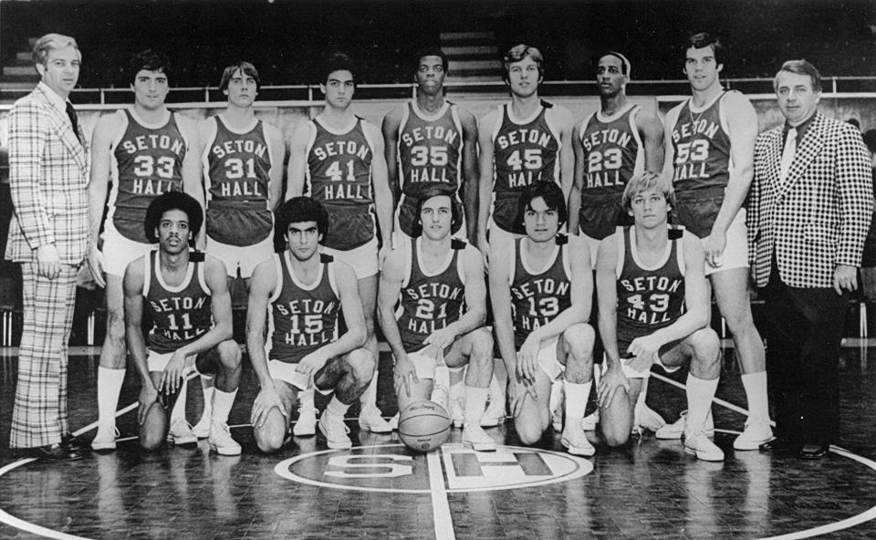 Bill Raftery (far left) poses with his Seton Hall team in Walsh Gym in 1976